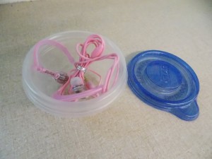 Storing earbuds in these little containers prevented tangling!