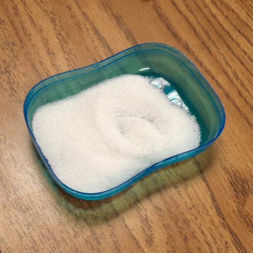 Use a travel soap container for salt or sand - instant sensory tracing activity!