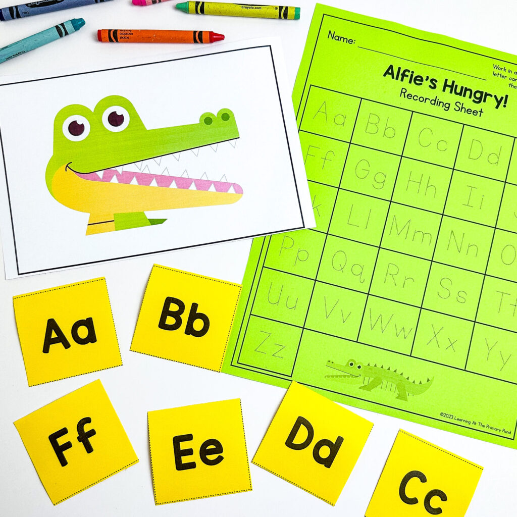 This is an alphabet game where kids practicing naming letters and tracing them on a recording sheet.